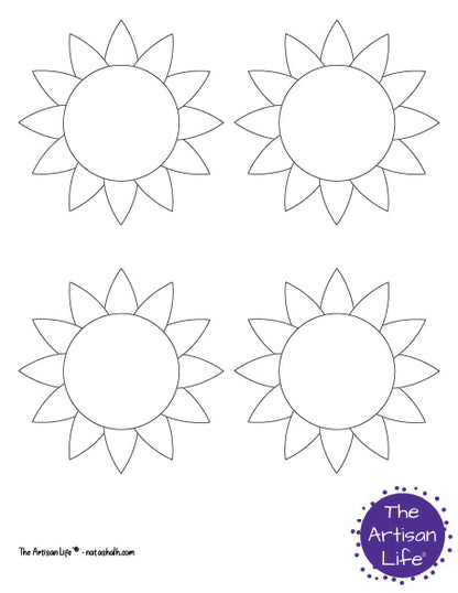 A page with four medium black and white sunflower patterns with flowers only, no stem